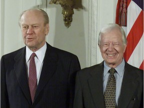 Former U.S. presidents Gerald Ford (left) and Jimmy Carter attend an event held in the East Room of the White House in 2000.