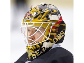 Goalie Mike Condon waits for a drill to begin as the Ottawa Senators practice at the Canadian Tire Centre in advance of their next game on Thursday night against Pittsburgh.