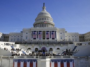In this Jan. 15, 2016, photo, the U.S. Capitol frames the backdrop over the stage during a rehearsal of President-elect Donald Trump's swearing-in ceremony in Washington.