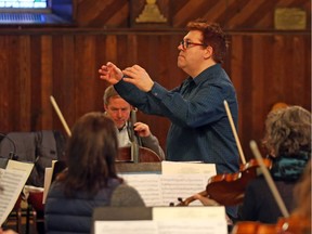 Kevin Mallon, Director of Thirteen Strings, rehearses the Ottawa-based chamber orchestra, which is staging a Concert for Peace this Friday.