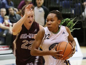 Sarah Besselink, seen attempting to slow down a Laurentian player in a file photo, scored 20 to lead the attack on Friday, Jan. 13, 2017.