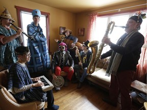 Members of the costumed avant-garde band Rake Star (L-R) Mike Essoudry, Vincent Mar, Rory Magill, Scott Warren, Don Cummings, Rob Frayne and David Broscoe gathered for a rehearsal in band leader Magill's house on Saturday morning, Jan. 14, 2017. (David Kawai)