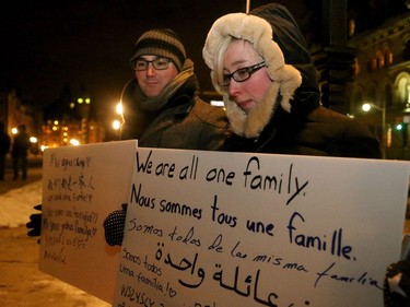 More than 1,000 people came out to a candlelight vigil for the victims of the Quebec mosque attack Monday (Jan. 30, 2017) in front of Parliament Hill's eternal flame. Julie Oliver/Postmedia