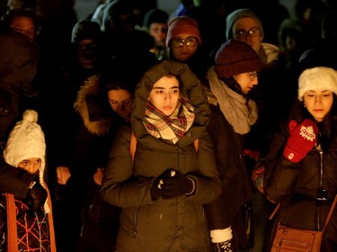 More than 1,000 people came out to a candlelight vigil for the victims of the Quebec mosque attack Monday (Jan. 30, 2017) in front of Parliament Hill's eternal flame. Julie Oliver/Postmedia