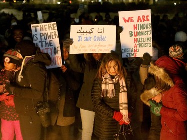 More than 1,000 people came out to a candlelight vigil for the victims of the Quebec mosque attack Monday (Jan. 30, 2017) in front of Parliament Hill's eternal flame. Julie Oliver/Postmedia