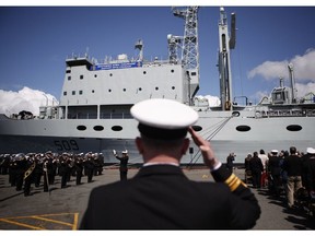 In this file photo, RCN personnel are seen at CFB Esquimalt for HMCS Protecteur's paying-off ceremony in Esquimalt, B.C., Thursday May 14, 2015. New facilities at the base will be built to allow for new warships expected over the next several decades.