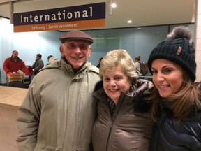 Barbara Hershorn finally got to the Ottawa airport for a family hug with her husband, Larry, and their daughter, Debbie Duncan, after being stranded in Fort Lauderdale for a day following a deadly shooting incident.