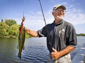 OTTAWA, ONTARIO: JULY 27, 2012 -- Hedrik Wachelka (seen here with a large mouth bass) is one of the world's greatest urban muskie hunters. For 50 years, he has pulled monsters from Dow's Lake, and urban stretches of the Rideau and Ottawa Rivers.