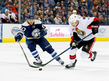 COLUMBUS, OH - JANUARY 19:  Kyle Turris #7 of the Ottawa Senators skates the puck past Ryan Murray #27 of the Columbus Blue Jackets during the first period on January 19, 2017 at Nationwide Arena in Columbus, Ohio.