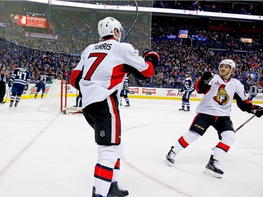 COLUMBUS, OH - JANUARY 19:  Mike Hoffman #68 of the Ottawa Senators congratulates Kyle Turris #7 of the Ottawa Senators after scoring a goal during the first period of the game against the Columbus Blue Jackets on January 19, 2017 at Nationwide Arena in Columbus, Ohio.
