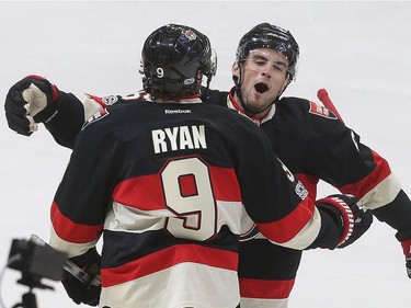 Ottawa Senators Bobby Ryan celebrates his first period goal against the Pittsburg Penguins with teammate Chris Wideman during first period  at the Canadian tire Centre in Ottawa Thursday Jan 12, 2017.   Tony Caldwell