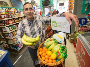 Owner Jasvir Dhillon of the Preston Food Market on Preston Street is selling fresh bananas, potatoes, other fruits and veggies as part of a new Ottawa Public Health initiative to get healthy food options in corner stores.