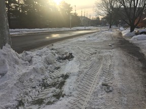 A snow plow sheared off a small tree on the western boulevard of Queen Elizabeth Place this week.