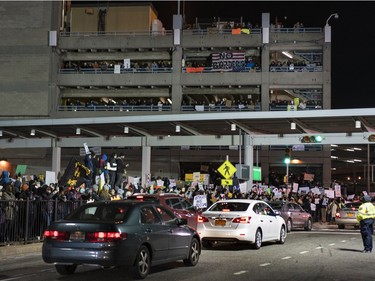 Protesters assemble at John F. Kennedy International Airport in New York.