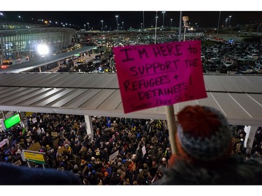 Protesters assemble at John F. Kennedy International Airport.