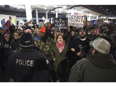 Protesters gather at O'Hare International Airport in Chicago.