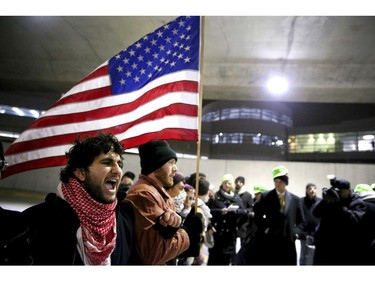 Protesters gather at O'Hare International Airport in Chicago.