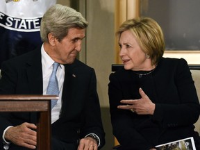 Hillary Clinton, right, talks with Secretary of State John Kerry at the completion of the U.S. Diplomacy Center Pavilion at the State Department in Washington earlier this week.