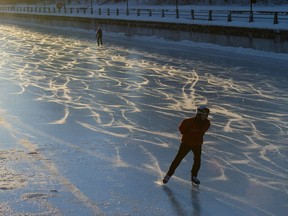 Skaters glide along the Rideau Canal.