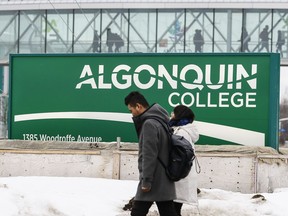 Students walk on the Woodroffe campus of Algonquin College in Ottawa. Errol McGihon/Postmedia
