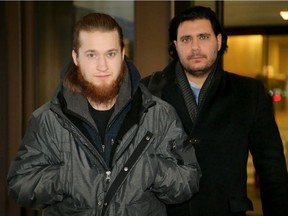 Tevis Gonyou McLean (left) leaves the Elgin Street courthouse Friday Jan. 6, 2017, with one of his lawyers, Biagio Del Greco, after being released on bail pending a terrorism peace bond hearing.