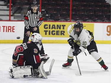 The Gloucester Rangers' Owen Outwater scores on the Ajax Pickering Raiders goaltender in the Minor Peewee AAA final.