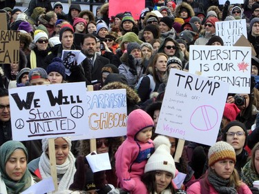 Thousands of people protest against the U.S. immigration policy of the Donald Trump administration, at the United States embassy in Ottawa, Monday, January 30, 2017.