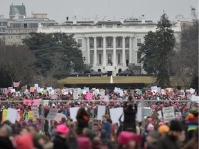 Demonstrators protest near the White House in Washington, DC, for the Women's March on Jan. 21, 2017.
