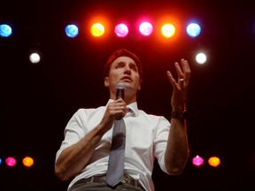 Prime Minister Justin Trudeau speaks during a town hall meeting in Belleville, Ont., on Thursday, January 12, 2017. THE CANADIAN PRESS/Adrian Wyld ORG XMIT: ajw131