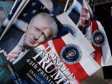 A vendor sells Donald Trump flags near the National Mall.