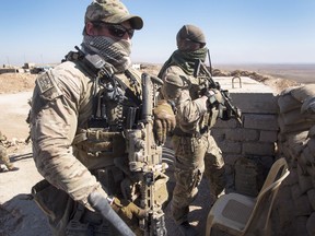 Canadian special forces look over a Peshmerga observation post, Monday, February 20, 2017 in northern Iraq. THE CANADIAN PRESS/Ryan Remiorz ORG XMIT: RYR102