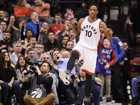 Toronto Raptors guard DeMar DeRozan (10) celebrates after scoring against the LA Clippers during second half NBA basketball action in Toronto on Monday, Feb.6, 2017.