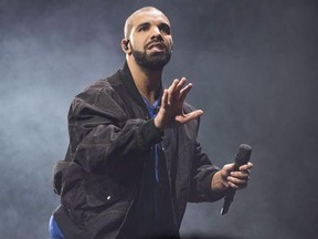 Drake performs onstage in Toronto in an Oct. 8, 2016 file photo. Several Canadians will be going for gold at tonight&#039;s Grammy Awards, including two of the country&#039;s biggest pop performers. Drake and Justin Bieber will square off against country singer Sturgill Simpson and pop powerhouses Adele and Beyonce, who are all nominated for album of the year.THE CANADIAN PRESS/AP, Arthur Mola, Invision