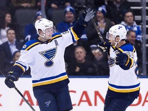 St. Louis Blues right wing Vladimir Tarasenko (91) celebrates his game-winning goal with defenceman Kevin Shattenkirk (22) after scoring against the Toronto Maple Leafs during the overtime period of an NHL game in Toronto on Thursday, February 9, 2017. It was six years ago this month that the Blues acquired Shattenkirk from the Colorado Avalanche. Now, Shattenkirk&#039;s future in St. Louis is in question. THE CANADIAN PRESS/Nathan Denette