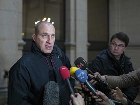 Chief suspect Vjeran Tomic faces the media at court for his trial in Paris, Monday Feb. 20, 2017, accused of involvement in one of the world&#039;s biggest art heists. Three people, including Vieran are accused of being involved in a dramatic 2010 theft of more than $100 million worth of artworks from the Paris Museum of Modern Art, including a Picasso, a Matisse and other masterpieces. (AP Photo/Thibault Camus)