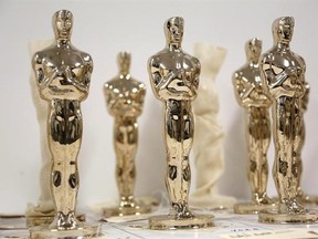 Oscar statuettes, some wrapped in cloth, wait to be inspected before being finished at the Polich Tallix Fine Art Foundry in Rock Tavern, N.Y., Thursday, Jan. 12, 2017. Mark Chiolis has been to the Oscars four times and has sat as close as fourth row. Chiolis attended as a seat filler, a coveted position employed by many awards shows to make the audience look packed when nominees and official guests leave their chairs.THE CANADIAN PRESS/AP, Seth Wenig