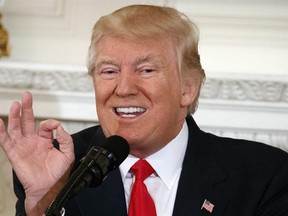 In this Feb. 27, 2017, photo, President Donald Trump speaks to a meeting of the National Governors Association at the White House in Washington. A presidential address to Congress is always part policy speech, part political theater. With Trump, a former reality TV star, there‚Äôs extra potential for drama as he makes his first address to Congress. (AP Photo/Evan Vucci)
