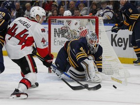 Buffalo Sabres goalie Robin Lehner (40) makes a stick-save against Ottawa Senators forward Jean-Gabriel Pageau (44) during the second period on Saturday Feb. 4, 2017, in Buffalo, N.Y.