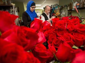 By the time Valentine's Day has come and gone, Richard McCoy of 123 Roses on Colonnade Rd in Nepean, and his helper Alaa El Chamaa, will have cleaned and prepared almost three thousand long stem roses, not to mention numerous other types of floral bouquets. He has about a thousand roses in stock and was expecting another delivery of about 2,000 later on Friday from his supplier in Montreal.  Wayne Cuddington/ Postmedia