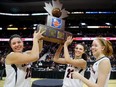 Carleton's Heather Lindsay (left), Elizabeth Leblanc and Catherine Traer (right), seen here following their team's victory in the 2017 Capital Hoops Classic, were all named OUA all-stars on Tuesday. Julie Oliver/Postmedia