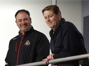 Pierre Dorion and Randy Lee at the Ottawa Senators NHL training camp in Ottawa on Friday, Sept. 18, 2015.