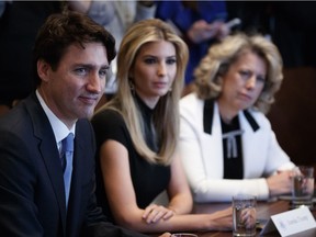 From left, Prime Minister Justin Trudeau, Ivanka Trump, daughter of President Donald Trump, and TransAlta CEO Dawn Farrell listen during a meeting of women business leaders in the Cabinet Room of the White House on Monday.