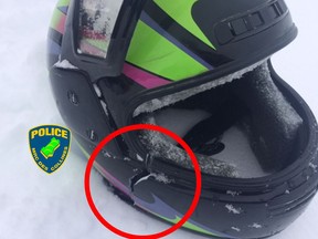 A couple driving a snowmobile in west Quebec on Saturday suffered injuries after their snowmobile flipped on a trail. The woman's helmet was broken under the force of impact.