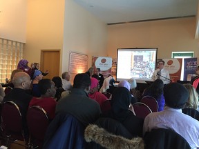 Mayor Jim Watson addresses an audience before the release of a report on anti-black racism in Ottawa on Thursday at Ottawa City Hall.