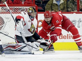 The Carolina Hurricanes' Jordan Staal shoots and scores against Ottawa Senators goalie Craig Anderson during the first period in Raleigh, N.C., on Friday, Feb. 24, 2017. The Senators got Saturday off despite a lacklustre effort against the Hurricanes.