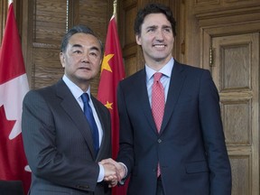 Prime Minister Justin Trudeau meets with Chinese Foreign Minister Wang Yi in June, 2016. China was once a recipient of Canadian aid; now it's an essential trading partner.