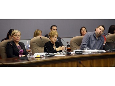 From left, Sandra Schwartz, Shirley Seward and Shawn Menard listen to a delegation.