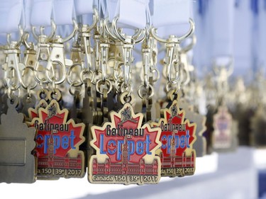 Medals hang at the finish line of the classic style Gatineau Loppet cross-country ski race in Gatineau on Saturday, February 18, 2017.