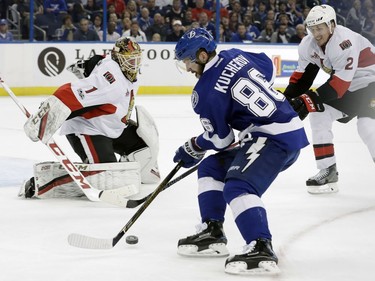 Tampa Bay Lightning right wing Nikita Kucherov (86), of Russia, gets a shot on Ottawa Senators goalie Mike Condon (1) during the second period of an NHL hockey game Thursday, Feb. 2, 2017, in Tampa, Fla. Defending for the Senators is Dion Phaneuf (2).
