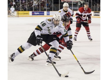 The Knights' Sam Miletic goes wide against a 67's defender.